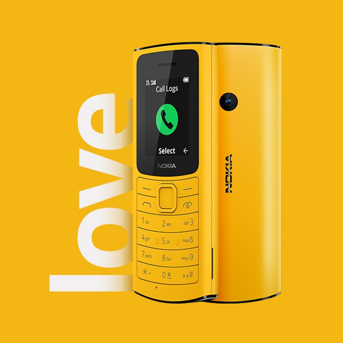 old yellow nokia push to talk phone